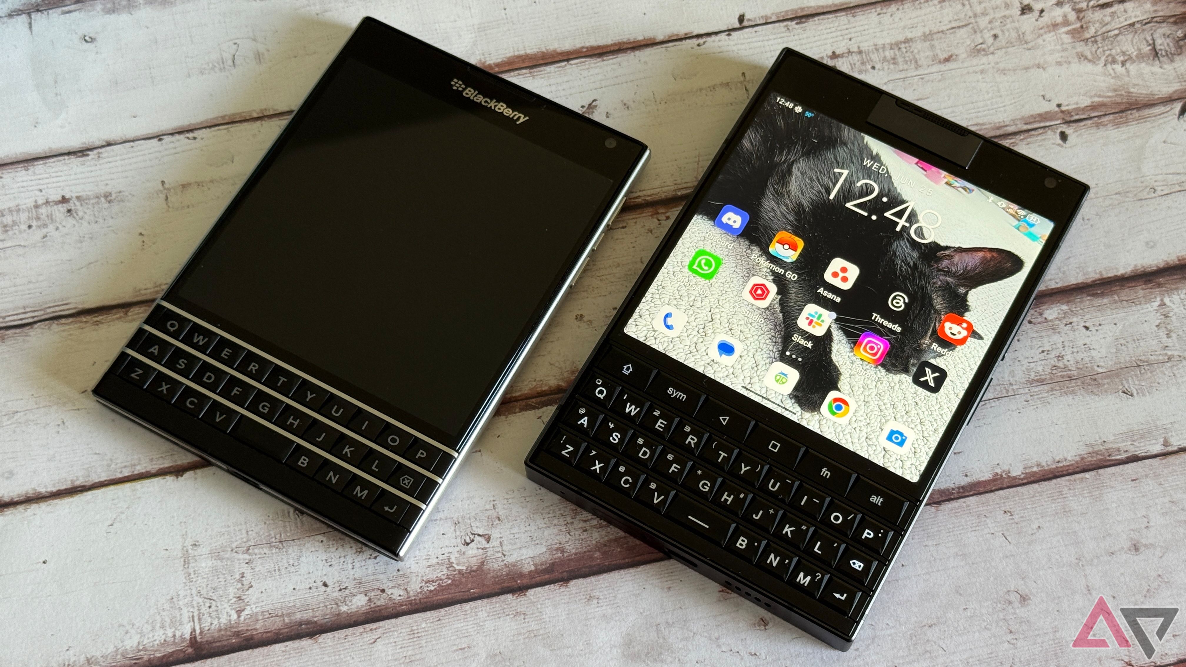 Unihertz Titan 2 sitting next to a BlackBerry Passport