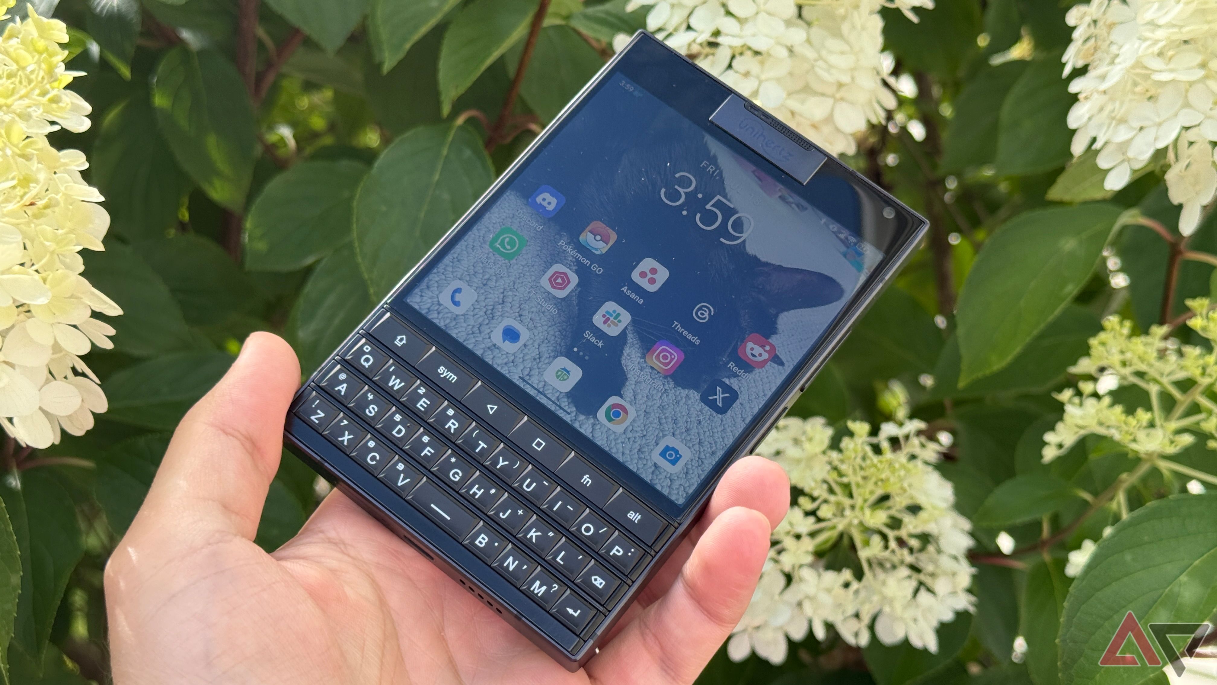 Unihertz Titan 2 set against white flowers