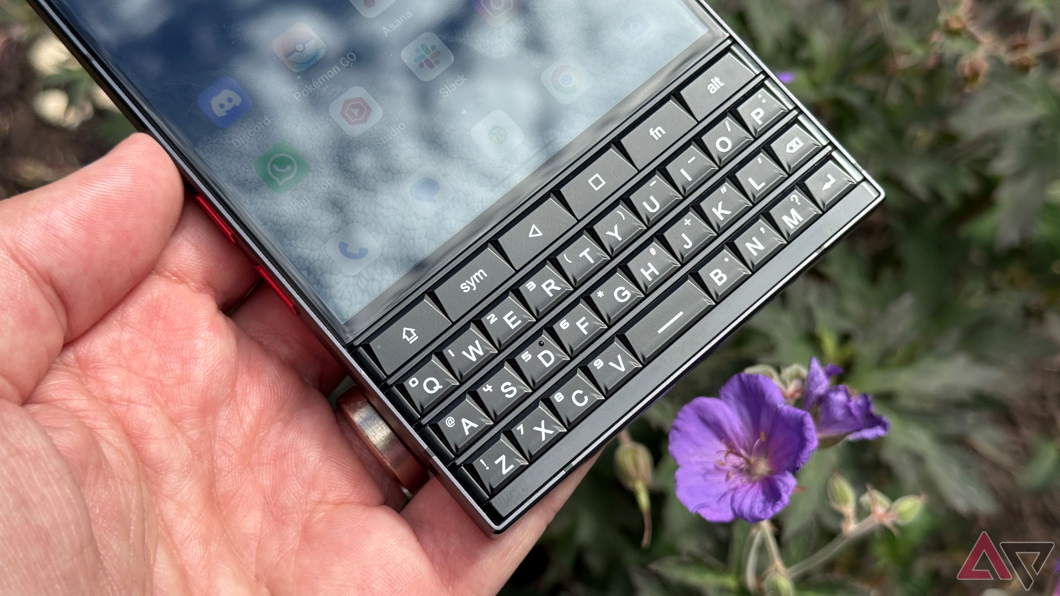 Unihertz Titan 2 keyboard set against purple flowers