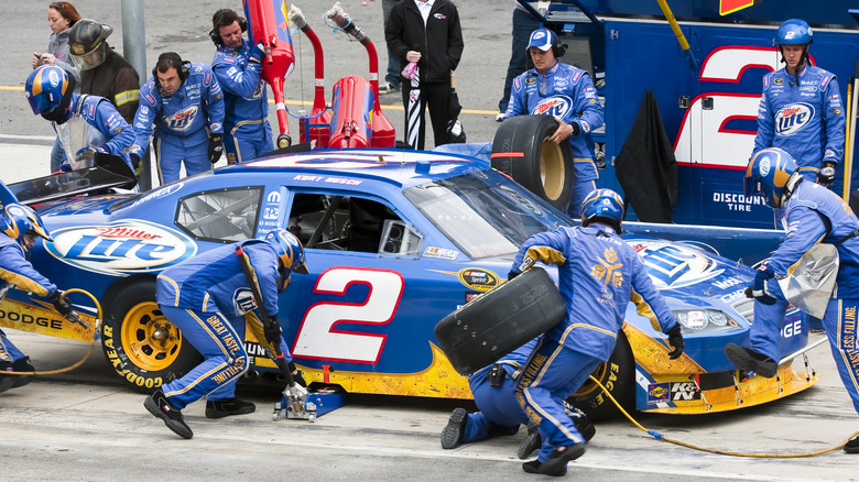 Kurt Busch's car gets a NASCAR pit stop including a tire change