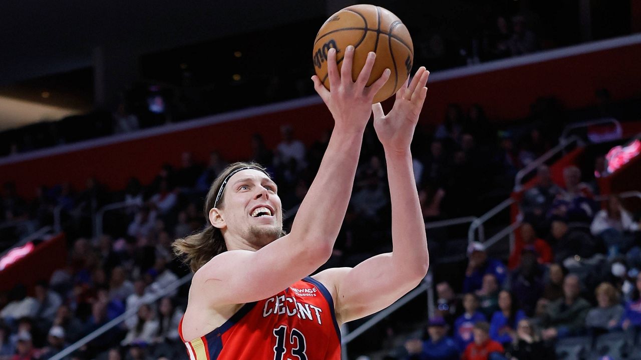 orward Kelly Olynyk (13) goes in for a layup against the Detroit Pistons during the second half of an NBA basketball game Sunday, March 23, 2025, in Detroit. (AP Photo/Duane Burleson)