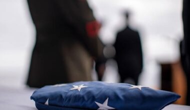 A folded American flag, flown aboard the amphibious assault ship USS Boxer