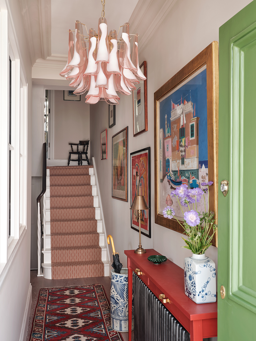 pink murano chandelier in entryway