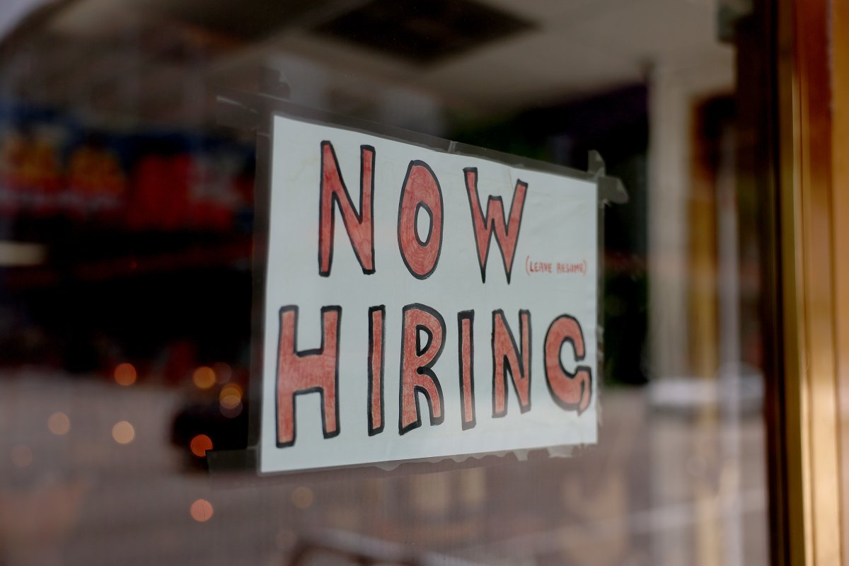 A 'Now Hiring' sign 