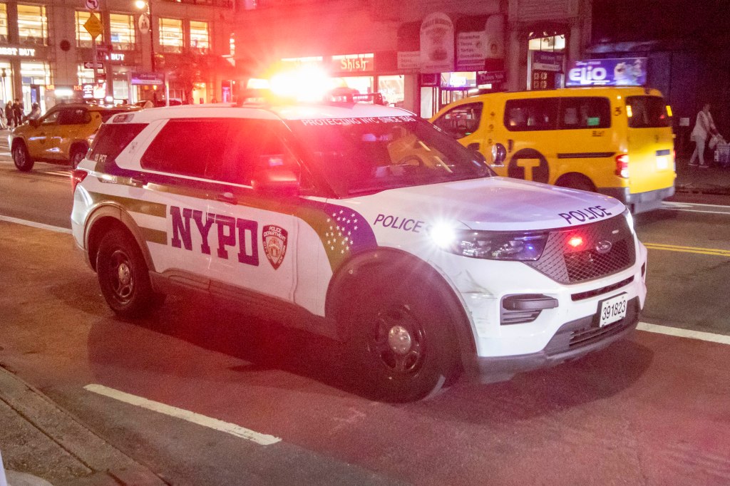 NYPD and at the scene of a slashing at 115 W. 23rd St. in Chelsea neighborhood of Manhattan.