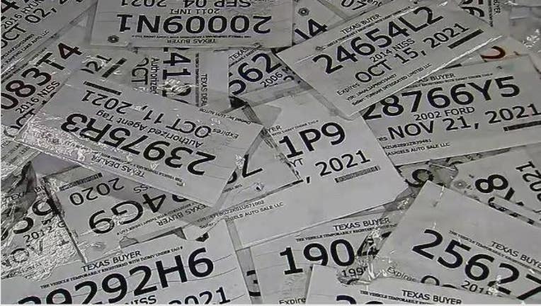 paper plates, paper tags, vehicle tag, fake plates