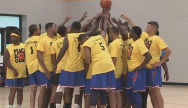 Philadelphia police, firefighters join anti-violence activists for "Peace Not Guns" basketball game