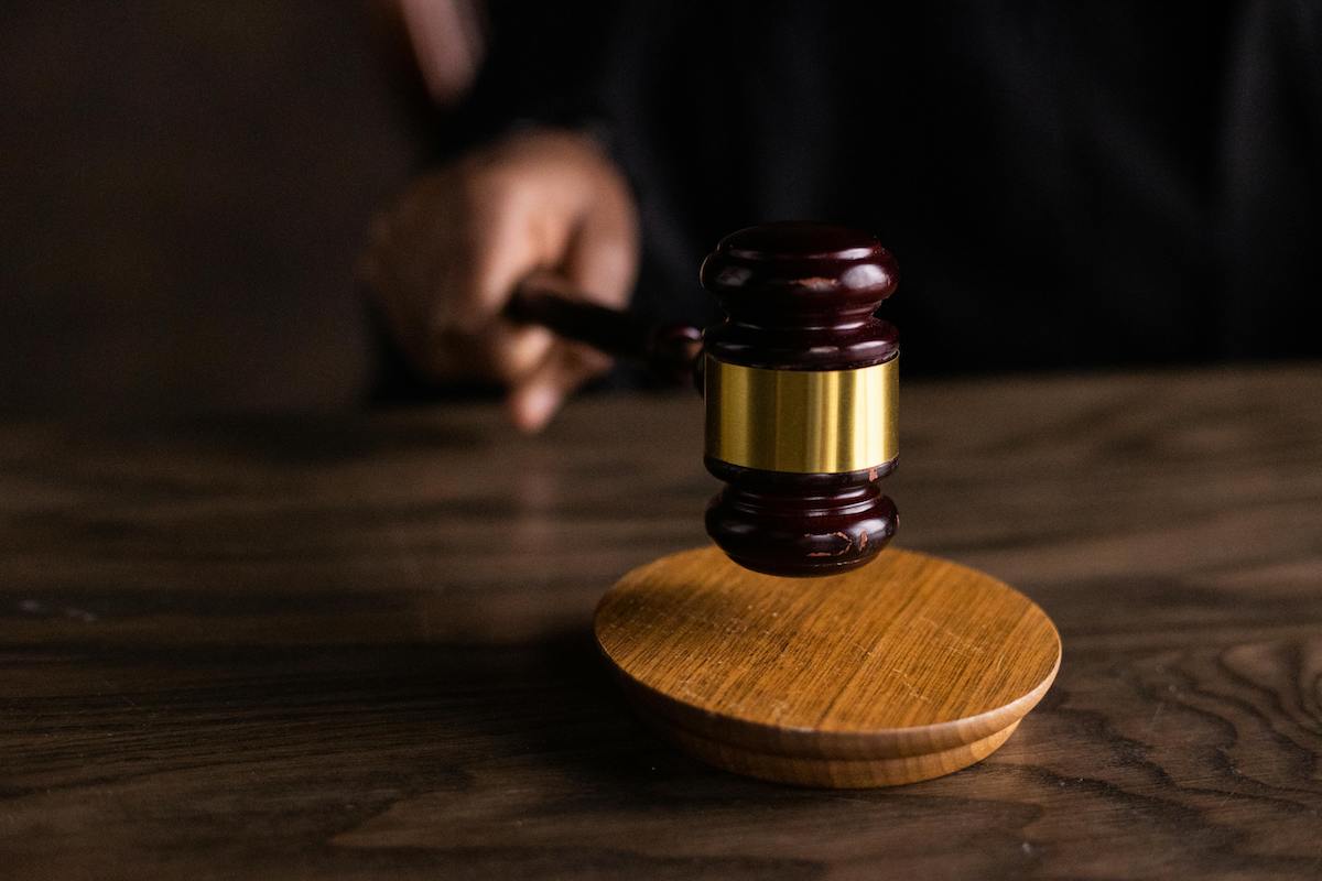 judge using a gavel. Medicaid cuts featured image