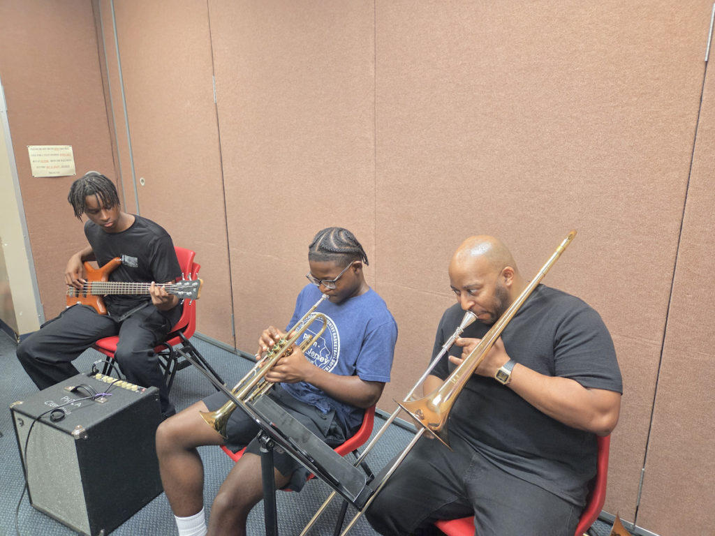 Saunders Sermons II, leading youth in music session