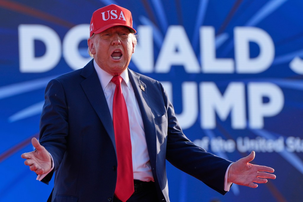 Donald Trump speaking at a rally.