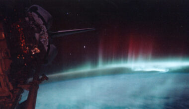 A red and green aurora as seen from outer space
