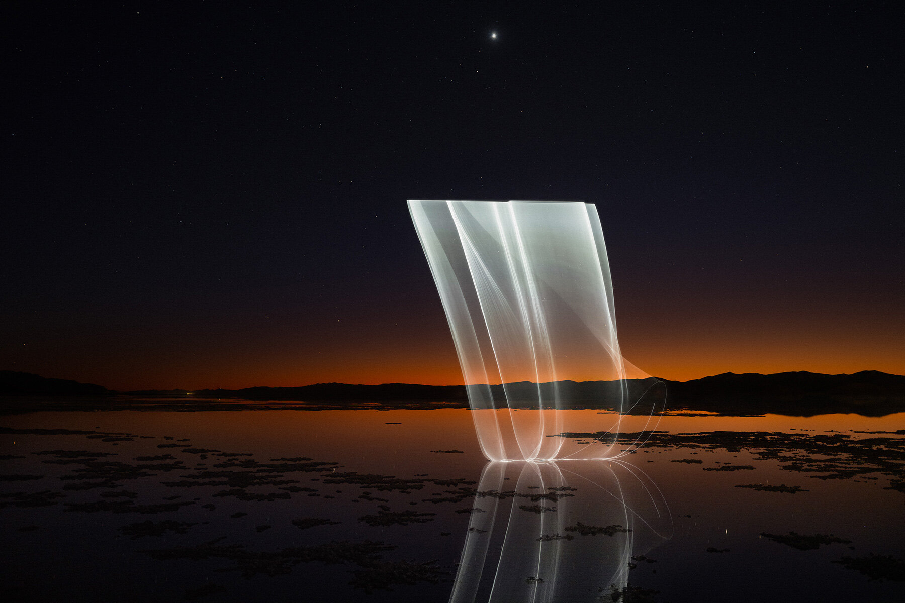 reuben wu draws aerial geometries with drones and lasers across remote landscapes