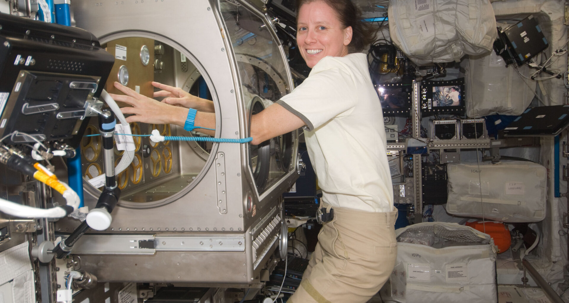 Astronaut on International Space Station working on science experiments