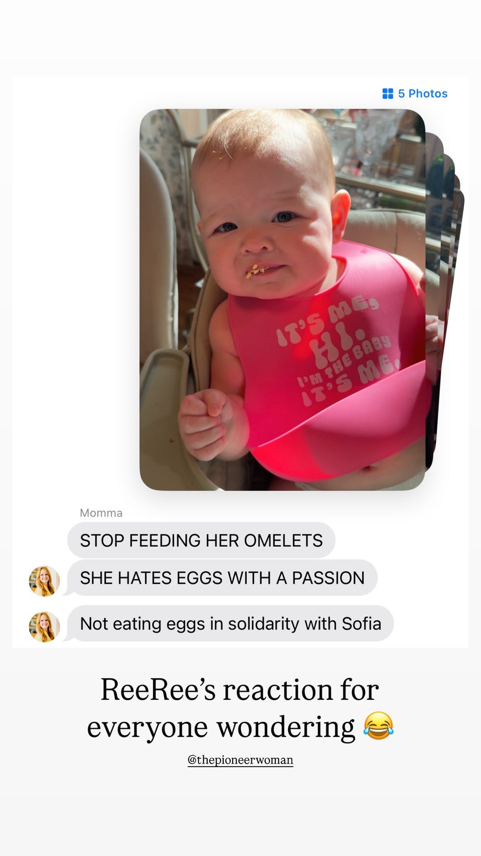 child wearing a bib expressing dislike for eggs