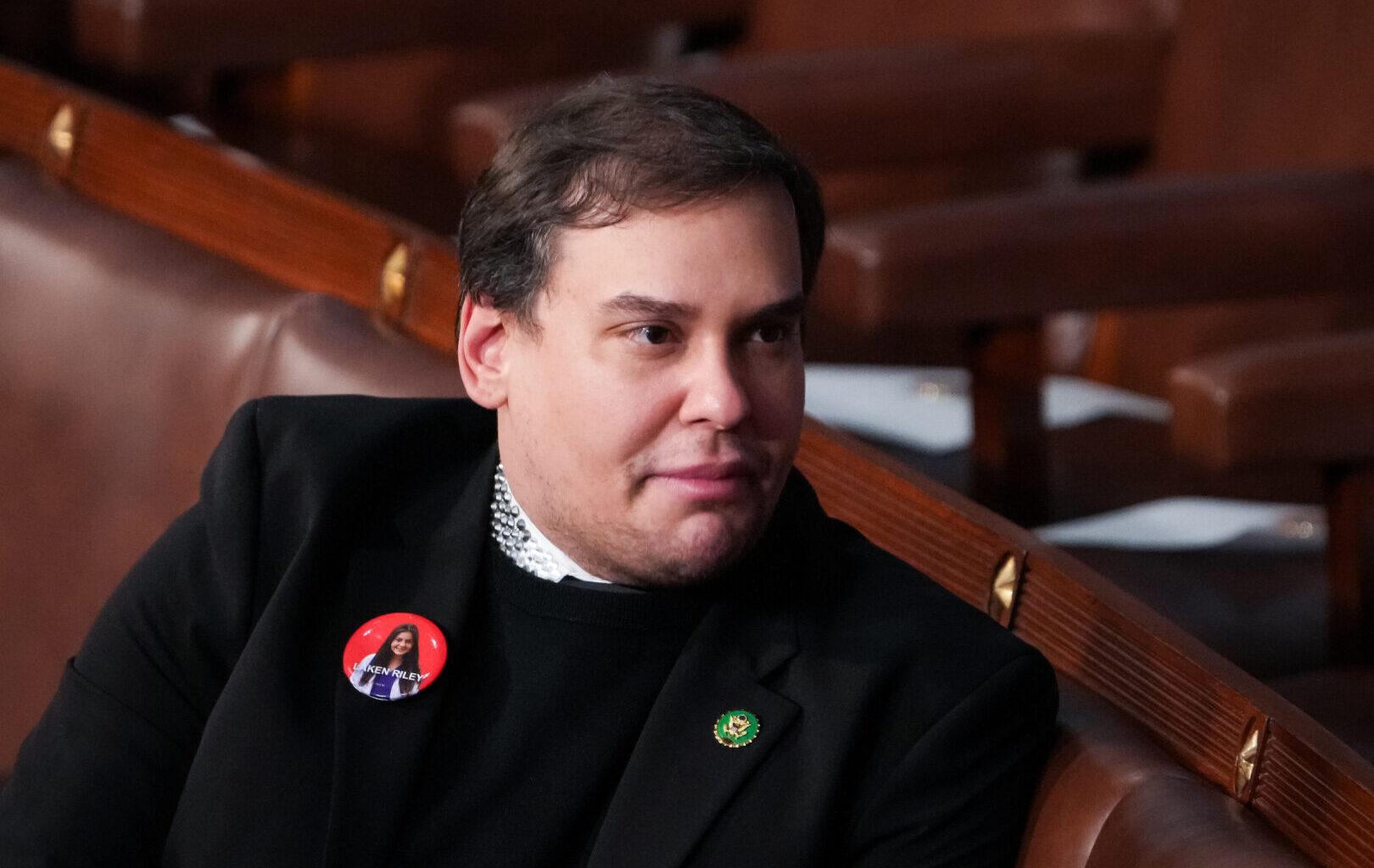 Former Rep. George Santos, R-N.Y., sits on the House floor before the start of President Joe Biden’s State of the Union Address to the joint session of Congress in the U.S. Capitol on Thursday, March 7, 2024.