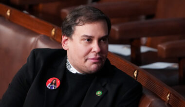 Former Rep. George Santos, R-N.Y., sits on the House floor before the start of President Joe Biden’s State of the Union Address to the joint session of Congress in the U.S. Capitol on Thursday, March 7, 2024.