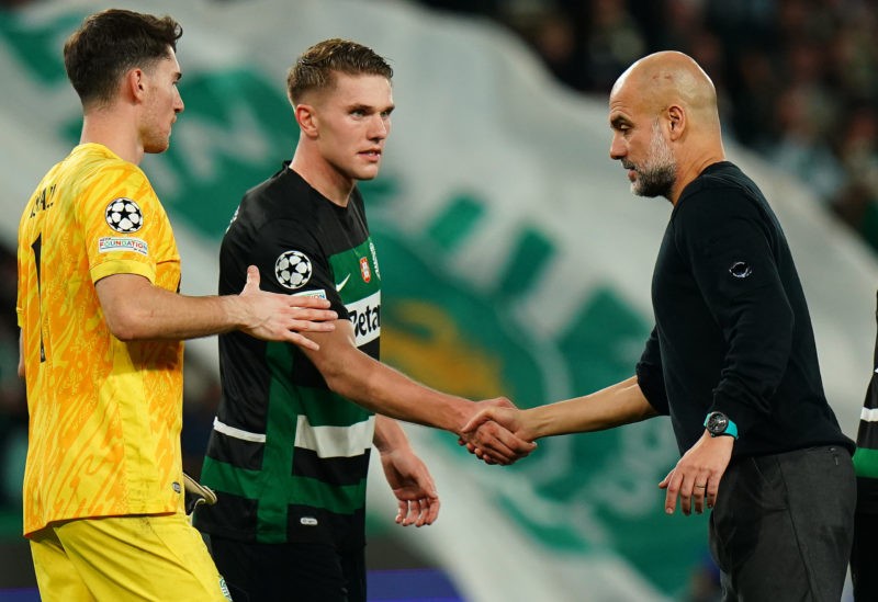 LISBON, PORTUGAL - NOVEMBER 5: Head Coach Josep Guardiola of Manchester City congratulates goal scorer Viktor Gyokeres of Sporting CP at the end of...