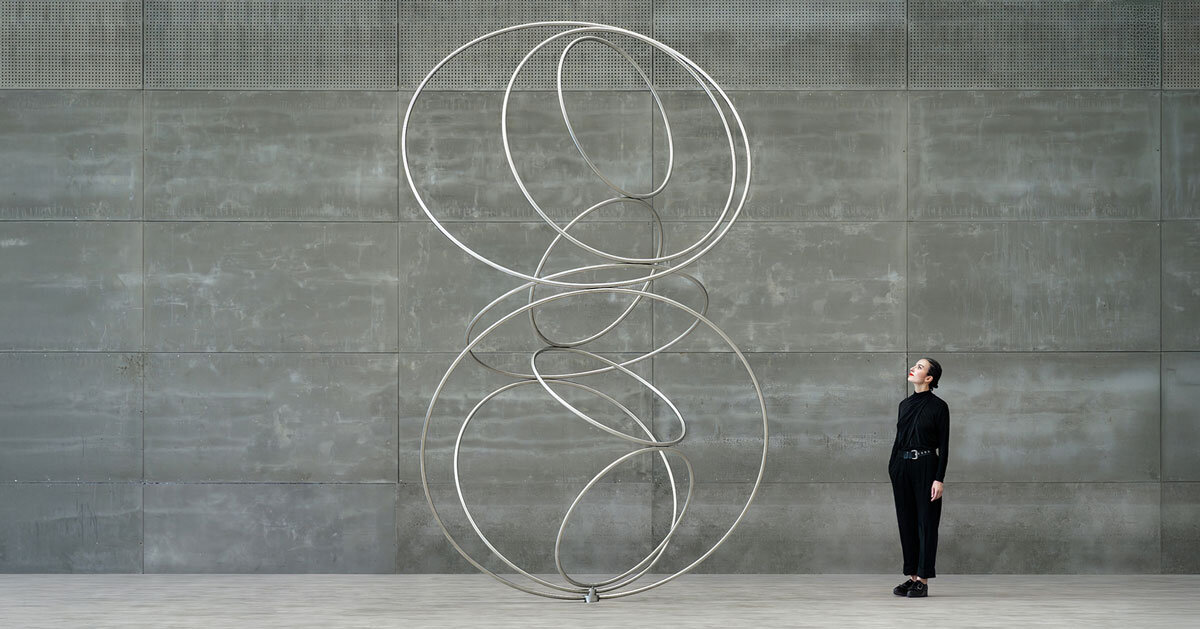nine steel rings continuously rotate in cycles for SpY's kinetic sculpture