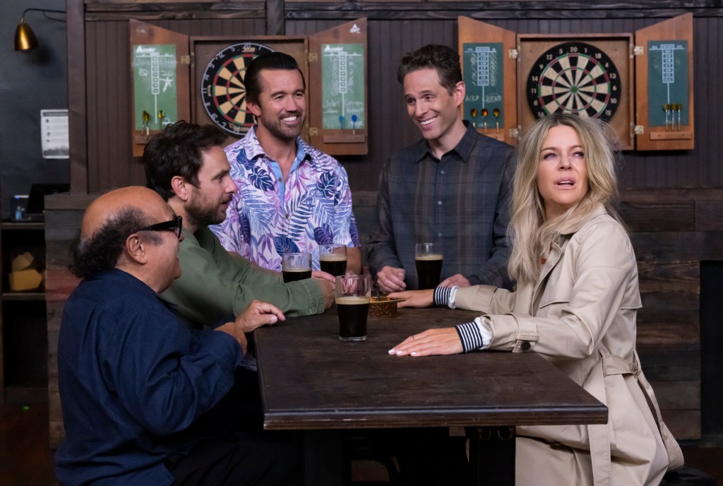 The cast of It's Always Sunny in Philadelphia in a pub scene.