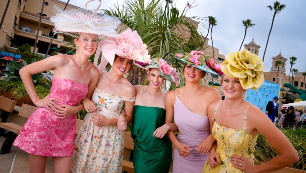 Left-to-right, Alex Follas of Oceanside, Emily Holmes of Alpine, Lana Klein of Poway, Victoria Kranyanski of Poway, and Olena Nalivkina of Alpine posed with their opening day hats. The ladies were among the competitors at the 31st annual Opening Day Hats Contest at the Del Mar Racetrack.  (Nelvin C. Cepeda / The San Diego Union-Tribune)