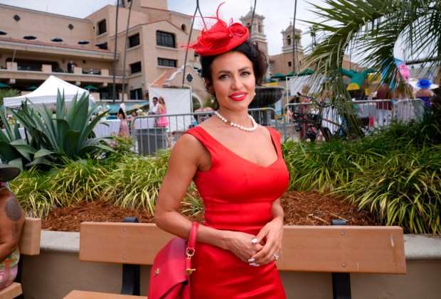 Anna Swain of Solana Beach was among race fans wearing fashionable hats on opening day at the Del Mar Racetrack. (Nelvin C. Cepeda / The San Diego Union-Tribune)