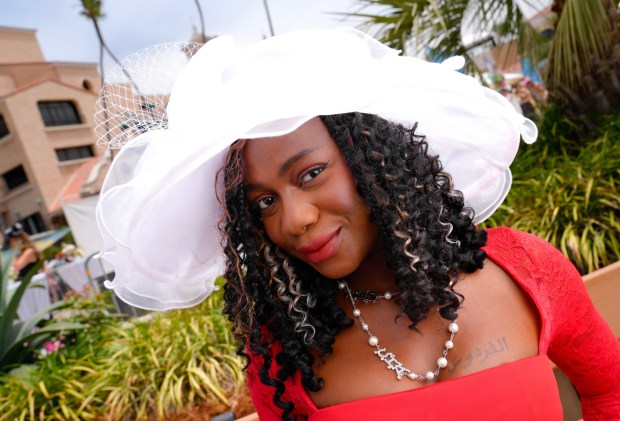At the 31st annual Opening Day Hats contest, Fridausi Sexton of La Jolla was among the gentlemen and ladies who participated in the annual opening day contest at the Del Mar Racetrack. (Nelvin C. Cepeda / The San Diego Union-Tribune)