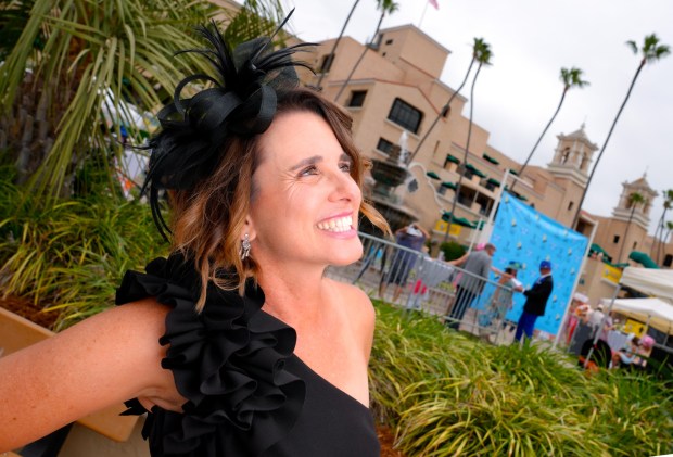 Stephanie Hebbel of Rancho Bernardo took part in the annual tradition of wearing beautiful hats on opening day at the Del Mar Racetrack. (Nelvin C. Cepeda / The San Diego Union-Tribune)