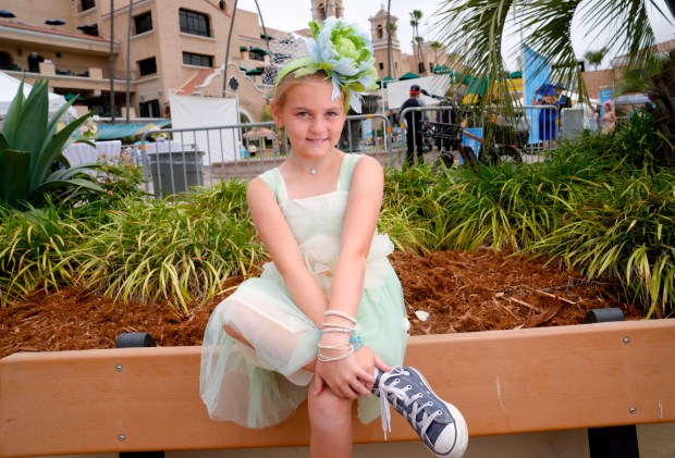 On Opening Day, Jacqueline Caldarella, 8, of Solana Beach, accessorized her hat with a pair of classic chucks at the Del Mar Racetrack.  (Nelvin C. Cepeda / The San Diego Union-Tribune)