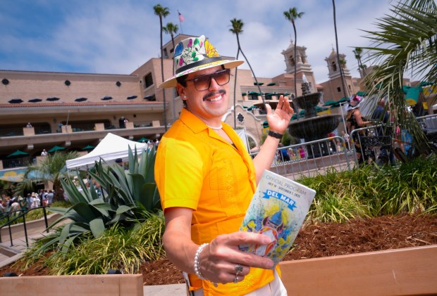 Arturo Lozano of Temecula was among those wearing beautiful hats on opening day at the Del Mar Racetrack. (Nelvin C. Cepeda / The San Diego Union-Tribune)