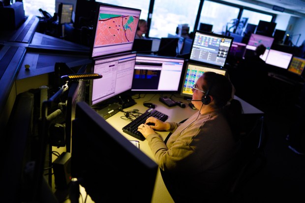 San Diego police dispatcher Taryn Hawthorne on duty at Police Headquarters on Wednesday. (Nelvin C. Cepeda / The San Diego Union-Tribune)