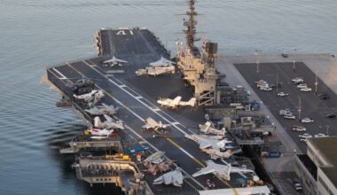 Sportfishing boat bumps into USS Midway