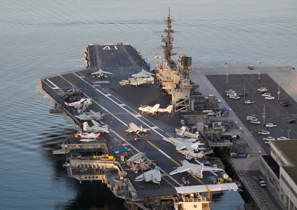Sportfishing boat bumps into USS Midway
