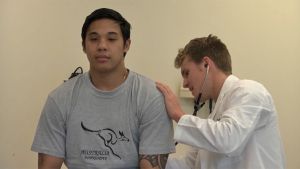 Health care provider treating a patient