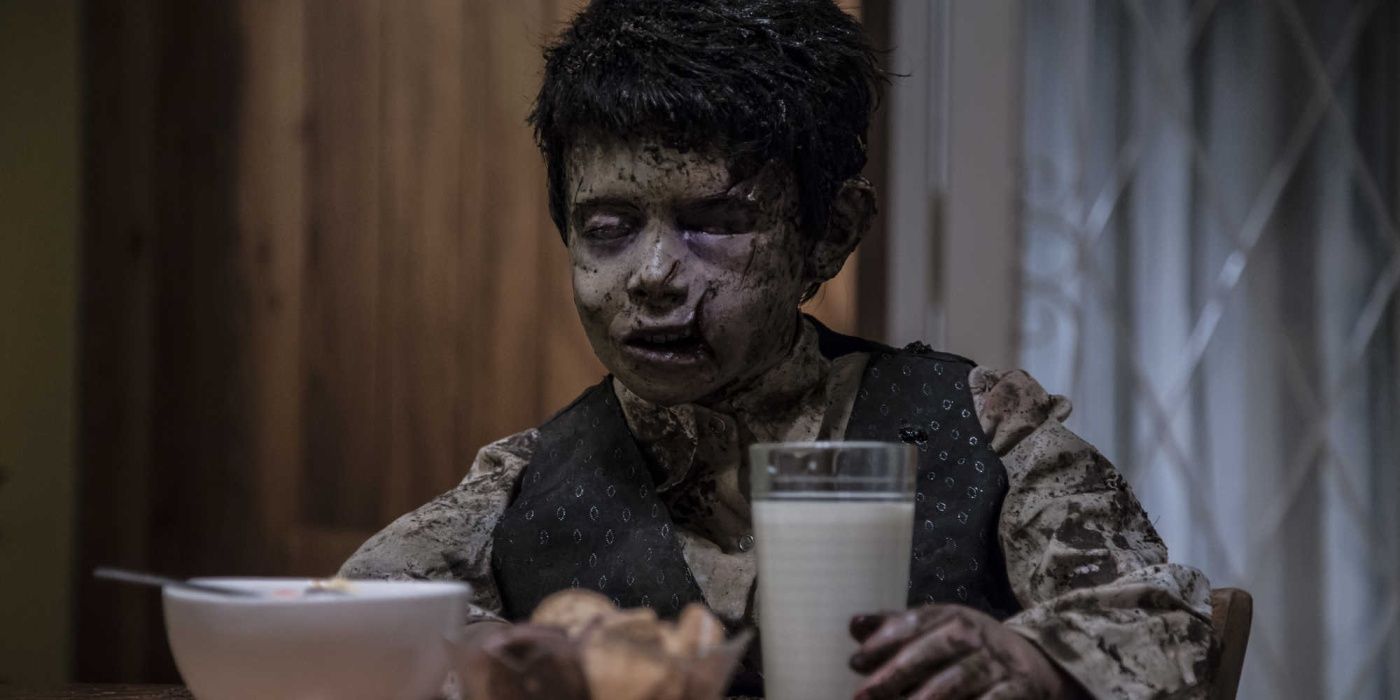 A corpse of a little boy mysteriously shows up at the table in 'Terrified' (2017)