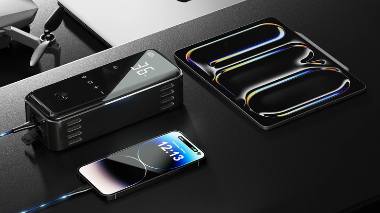 Comparing the Denvix MotorX inflator size to a smartphone