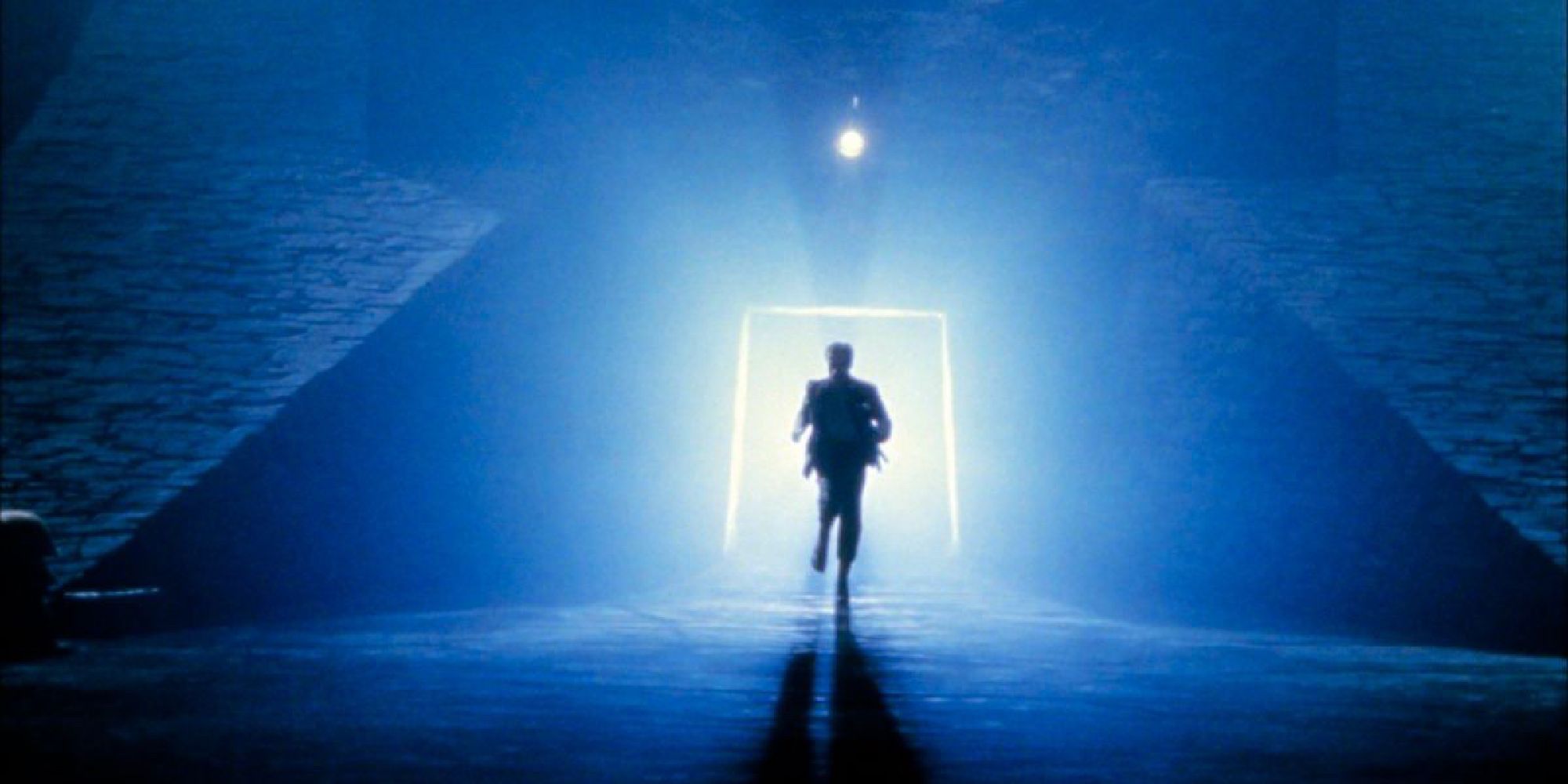 A man running towards a light in The Keep - 1983