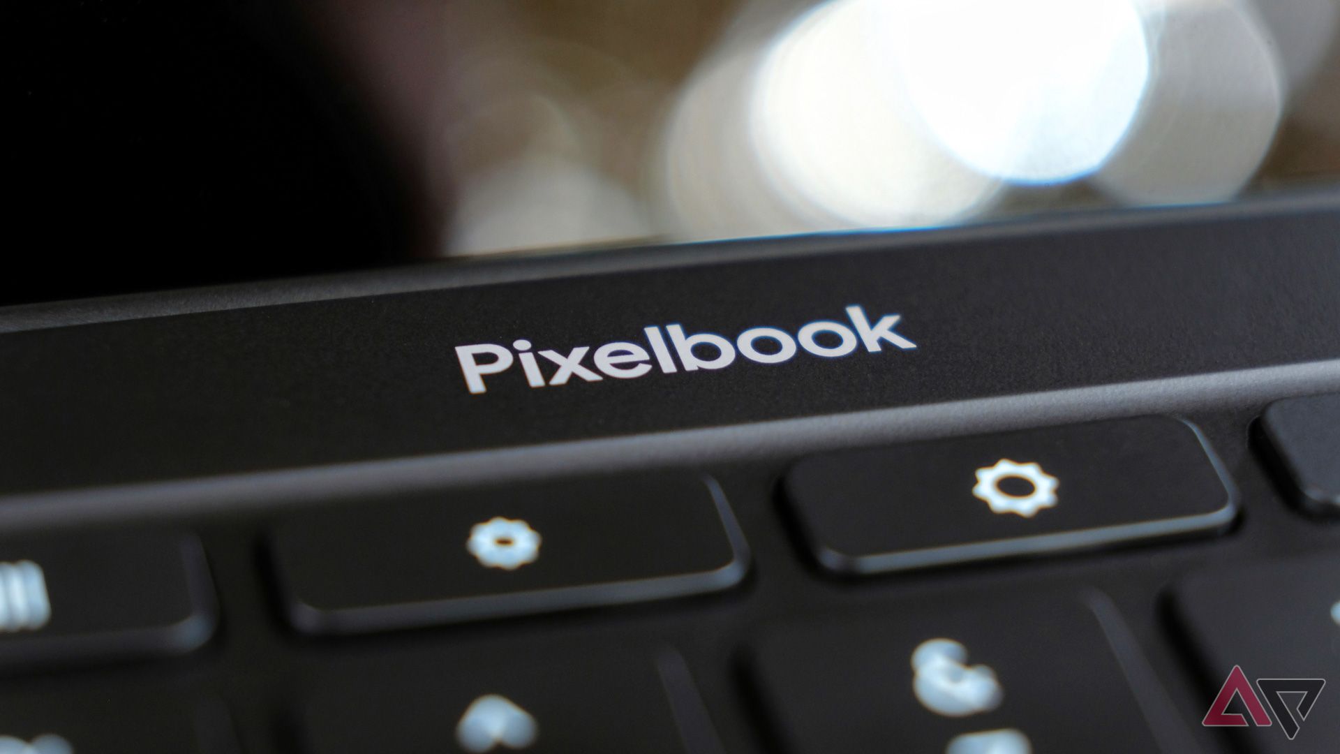 A closeup of the Pixelbook wordmark on the Pixelbook Go.