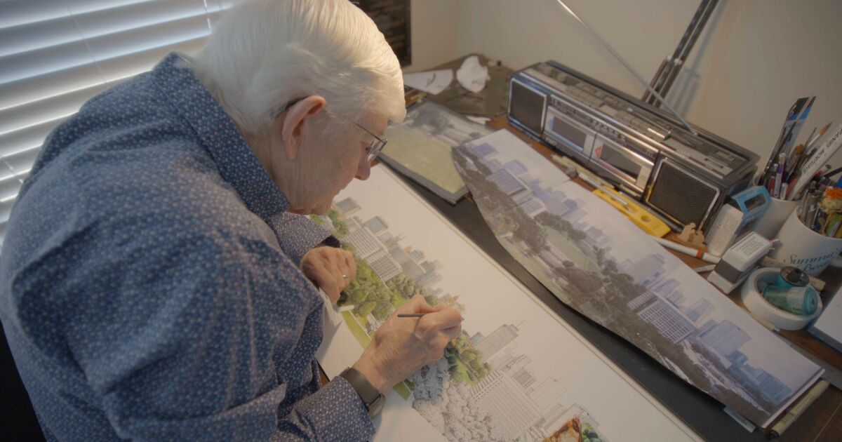 Beloved artist Phil Ponder is working on his latest Nashville skyline painting