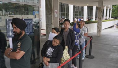 Families seek answers as they wait outside an LA immigration center