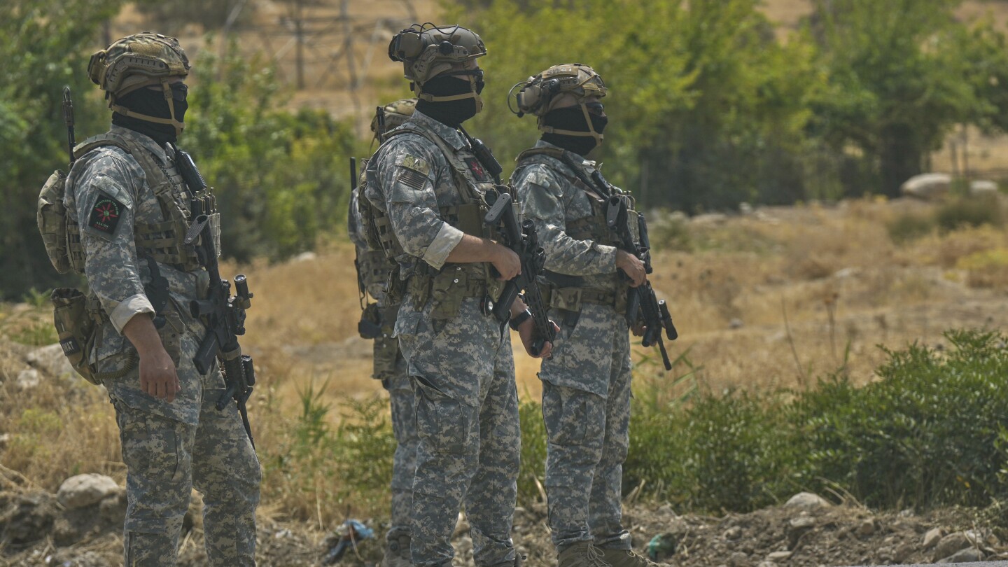 PKK fighters begin disarmament in northern Iraq