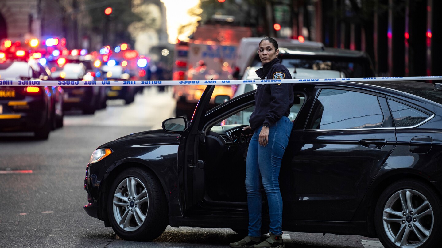 NYC shooting: At least 5 people including NYPD officer killed in Manhattan