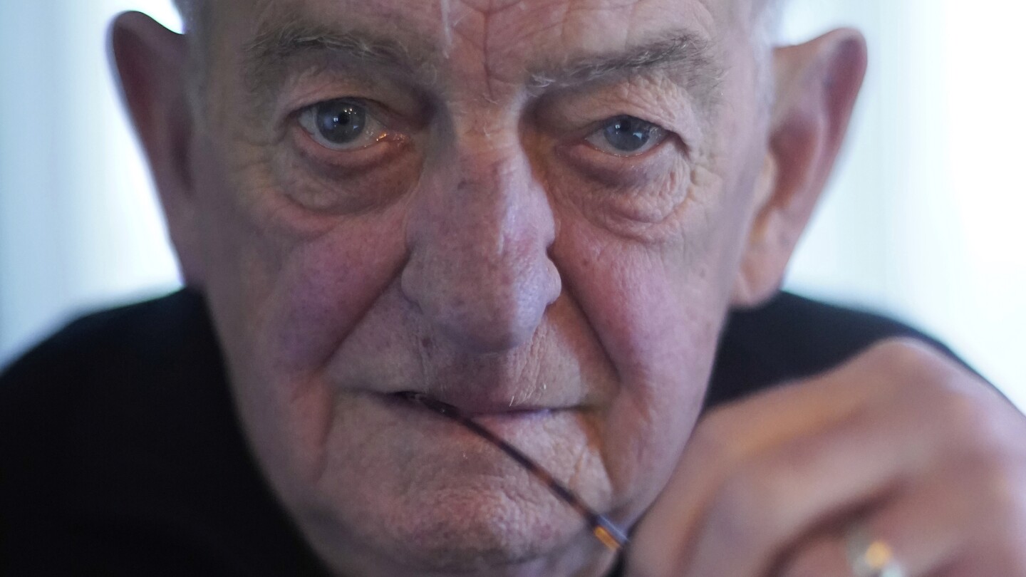 Award-winning AP photographer Bob Daugherty captured history with speed and persistence