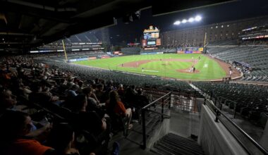 Why did the Orioles and Rockies keep playing after fans evacuated seats?