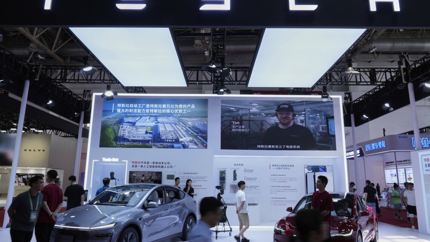 Trump offers support to Musk's car company as Tesla stock plunges