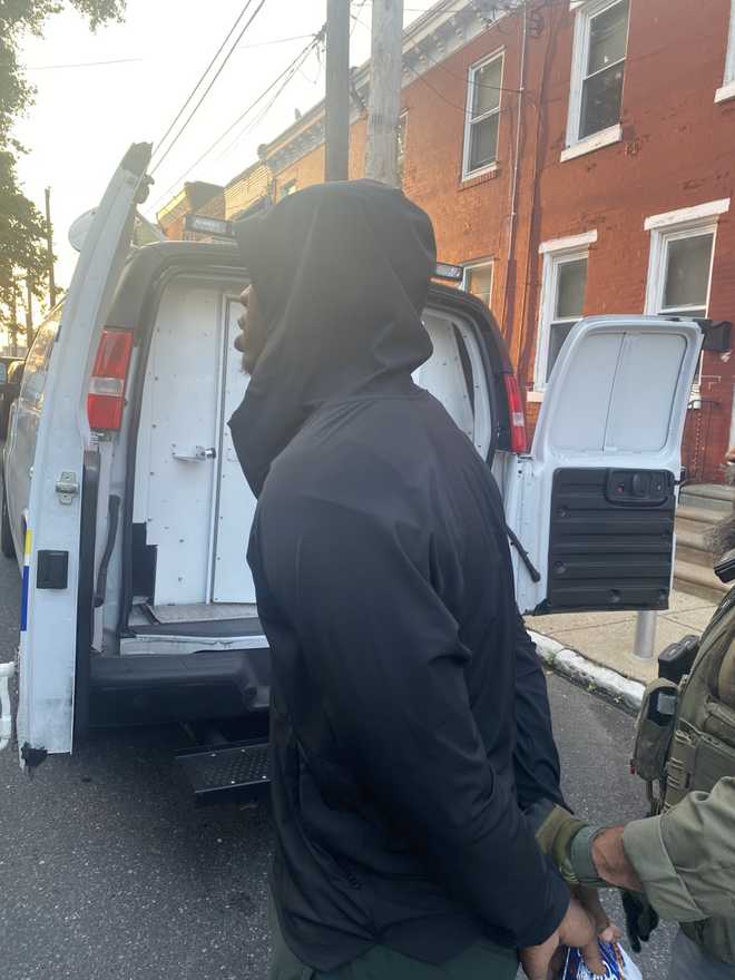 A man wanted for a 2024 mass shooting that left three people dead in Philadelphia was arrested Thursday morning following a standoff.