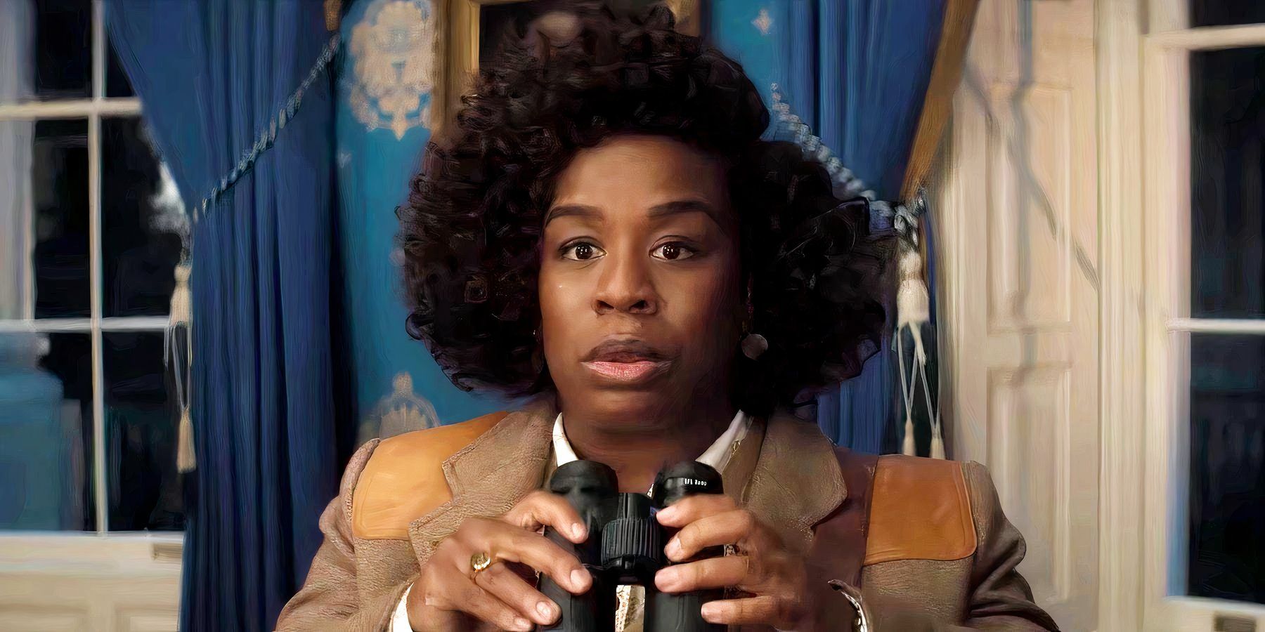 Uzo Aduba hoding binoculars in The Residence