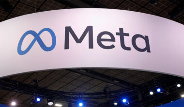 Blue Meta logo, with black Meta text on a white banner