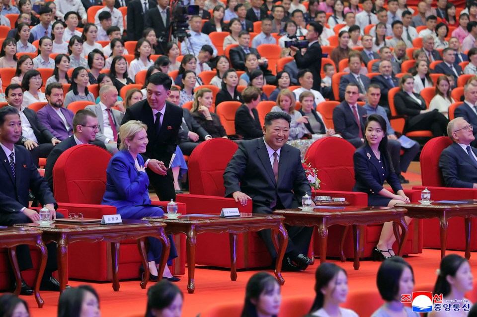 Kim Jong Un, his daughter, and Russian Minister of Culture Olga Lyubimova watching a performance.