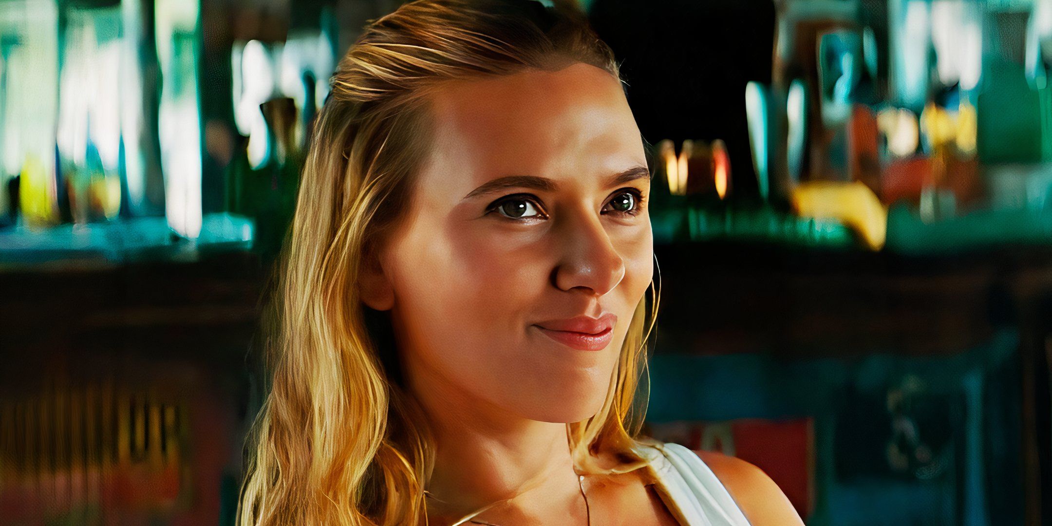 Scarlett Johansson smiles as Zora Bennett in Jurassic World Rebirth