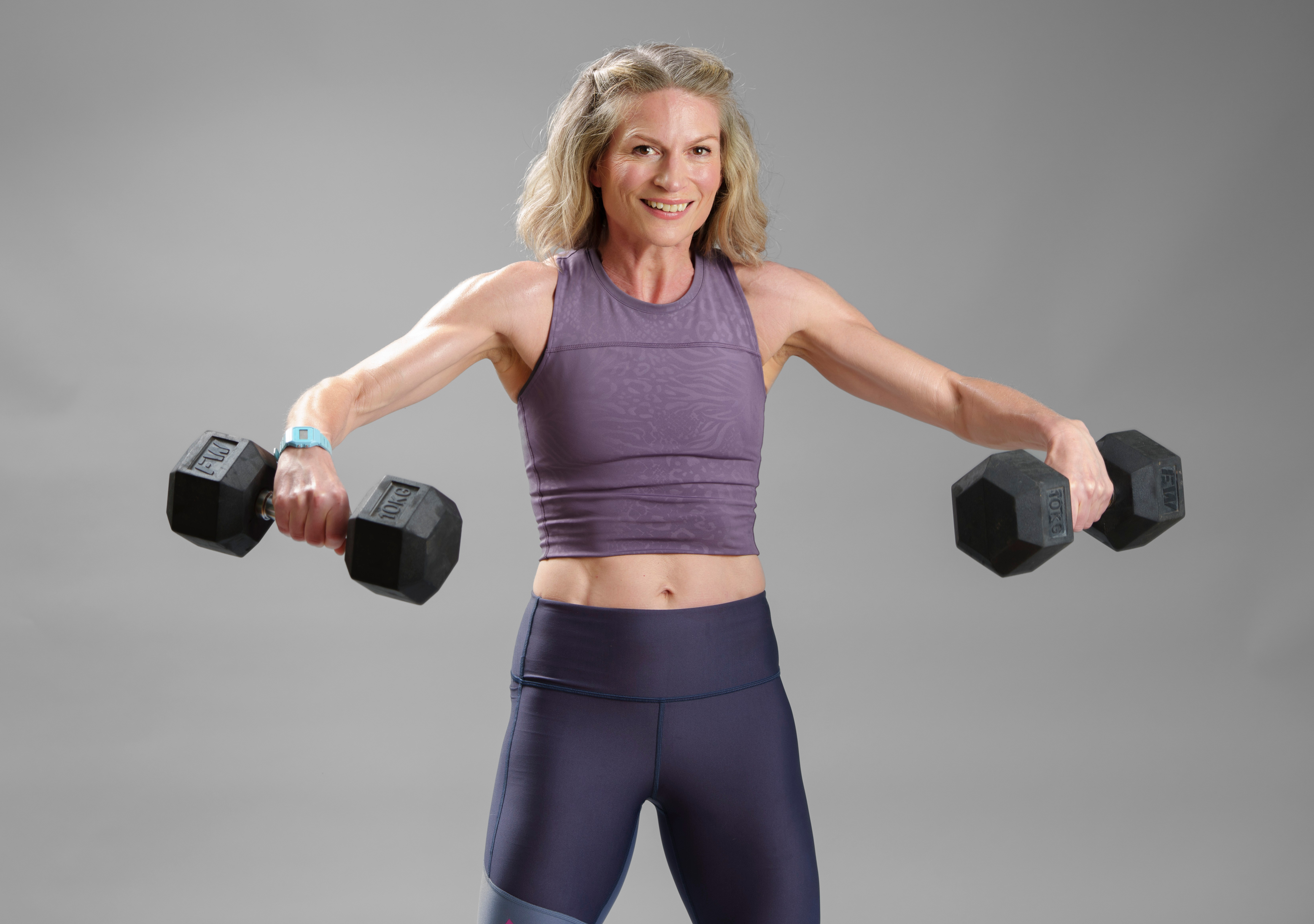Woman lifting weights.